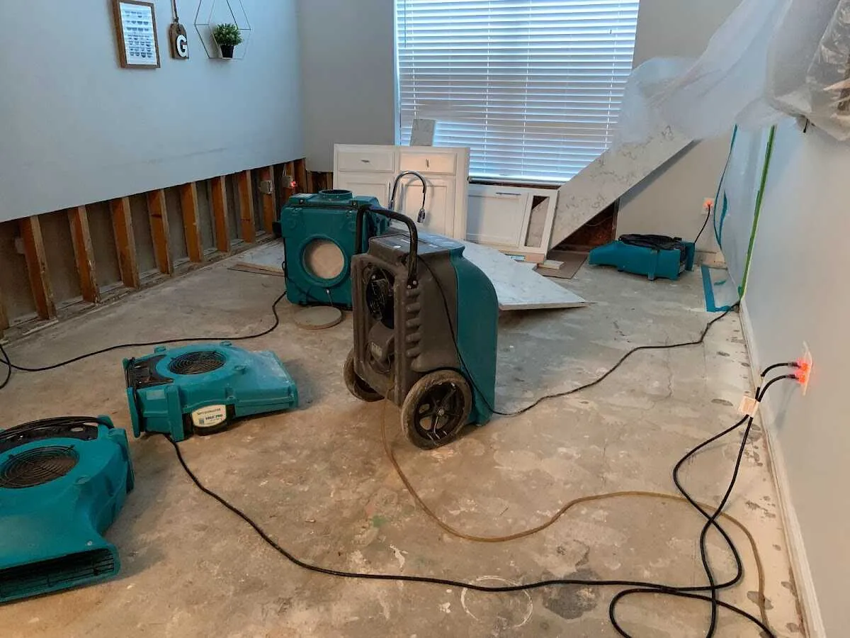 Dehumidifier in flood-cut room for Water Damage Restoration in Carolina Shores